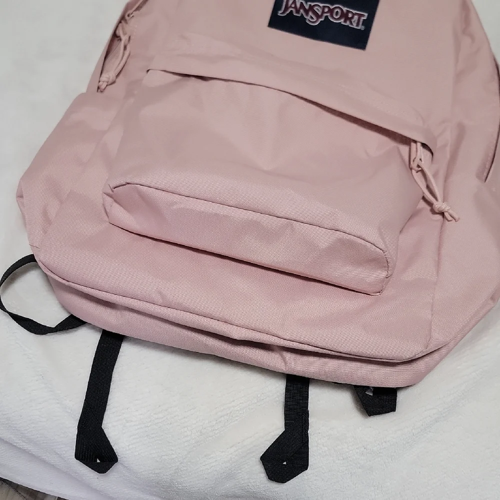 Like New Jansport Light Pink Classic Backpack W/ Front, Inside And Side Pocket